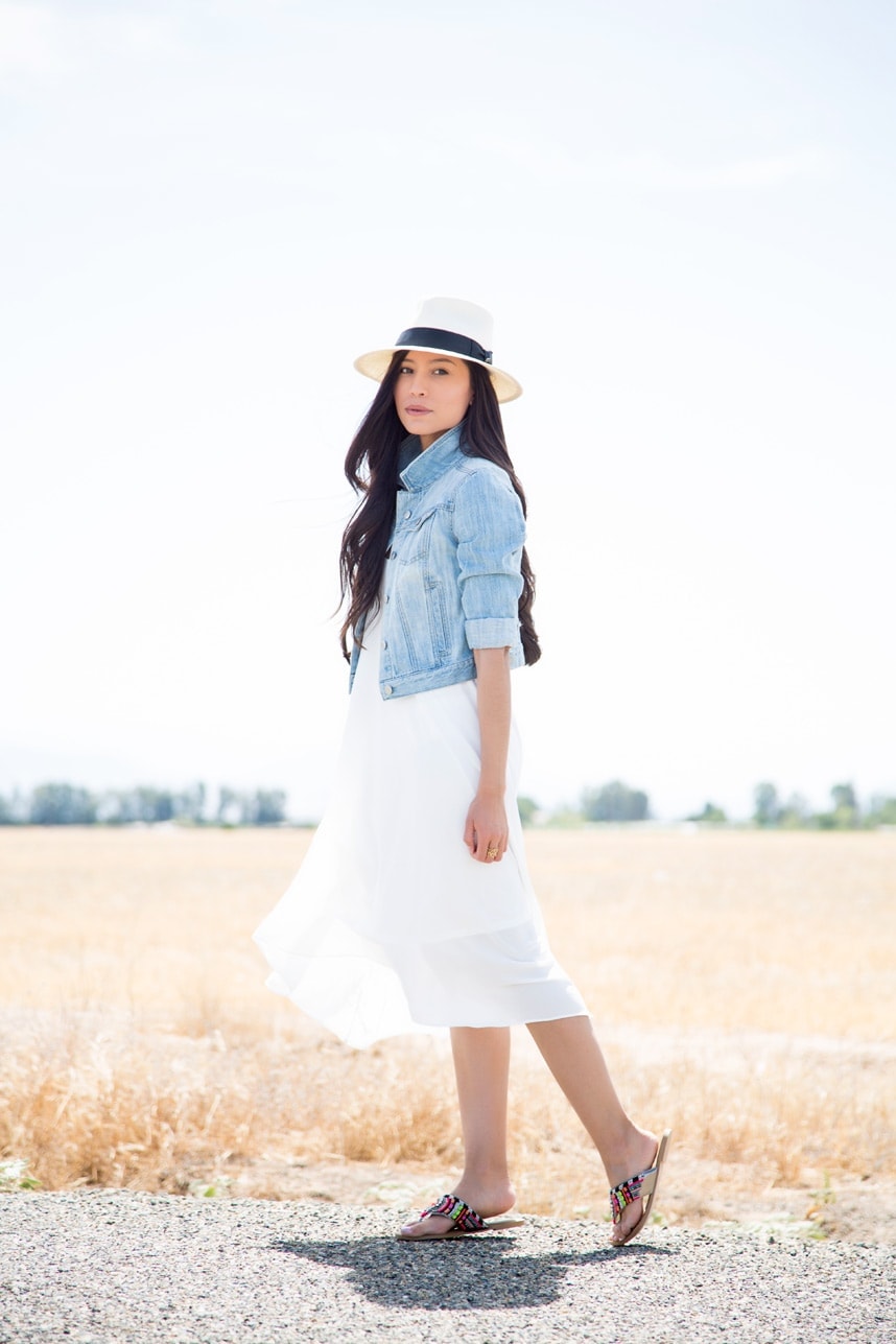 long flowy white dress with a cropped denim jacket outfit - stylishlyme.com