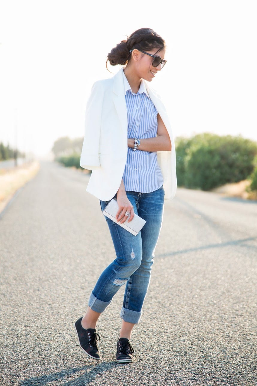 White blazer worn with distressed denim - Visit Stylishlyme.com for more outfit photos and style tips