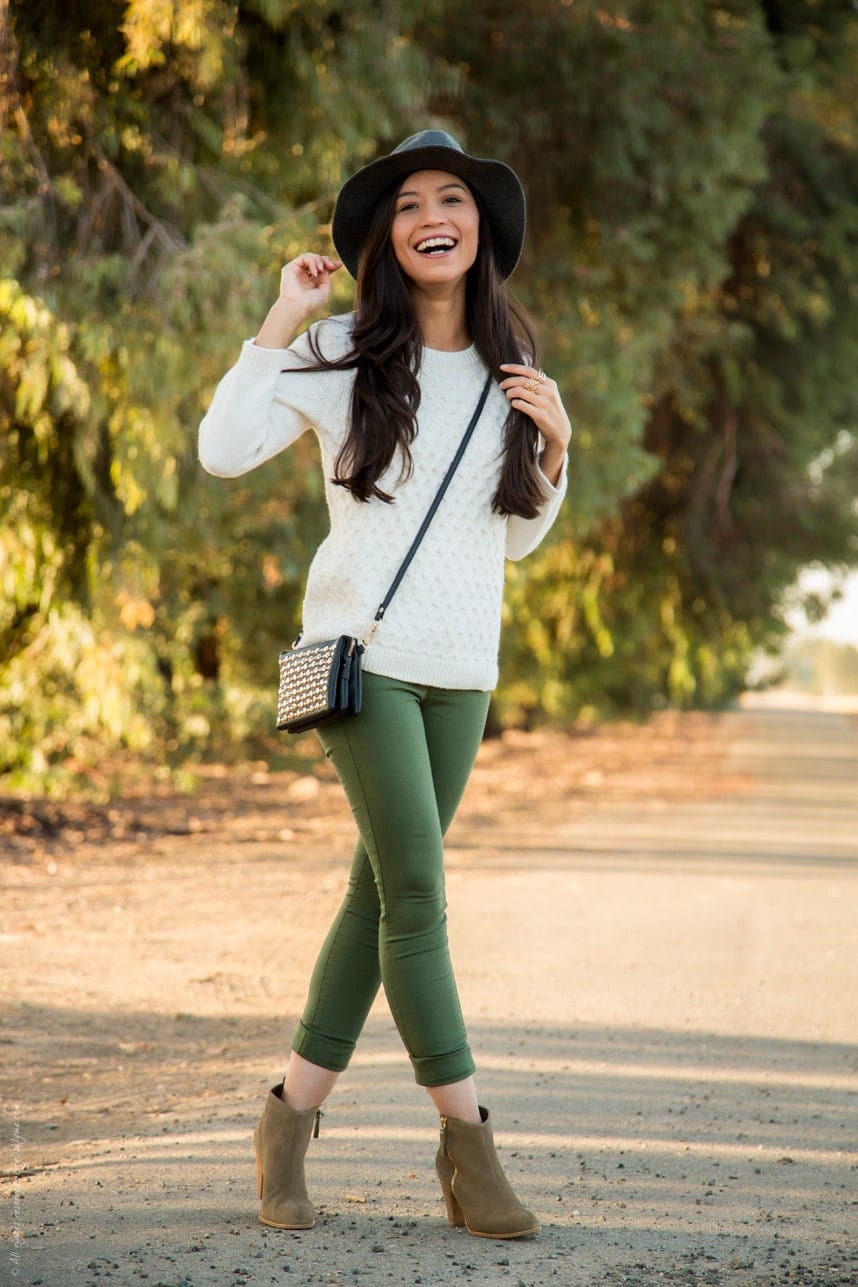 A cute fall outfit, olive green pants and cream sweater with fall accessories - Visit Stylishlyme.com for more outfit inspiration and style tips
